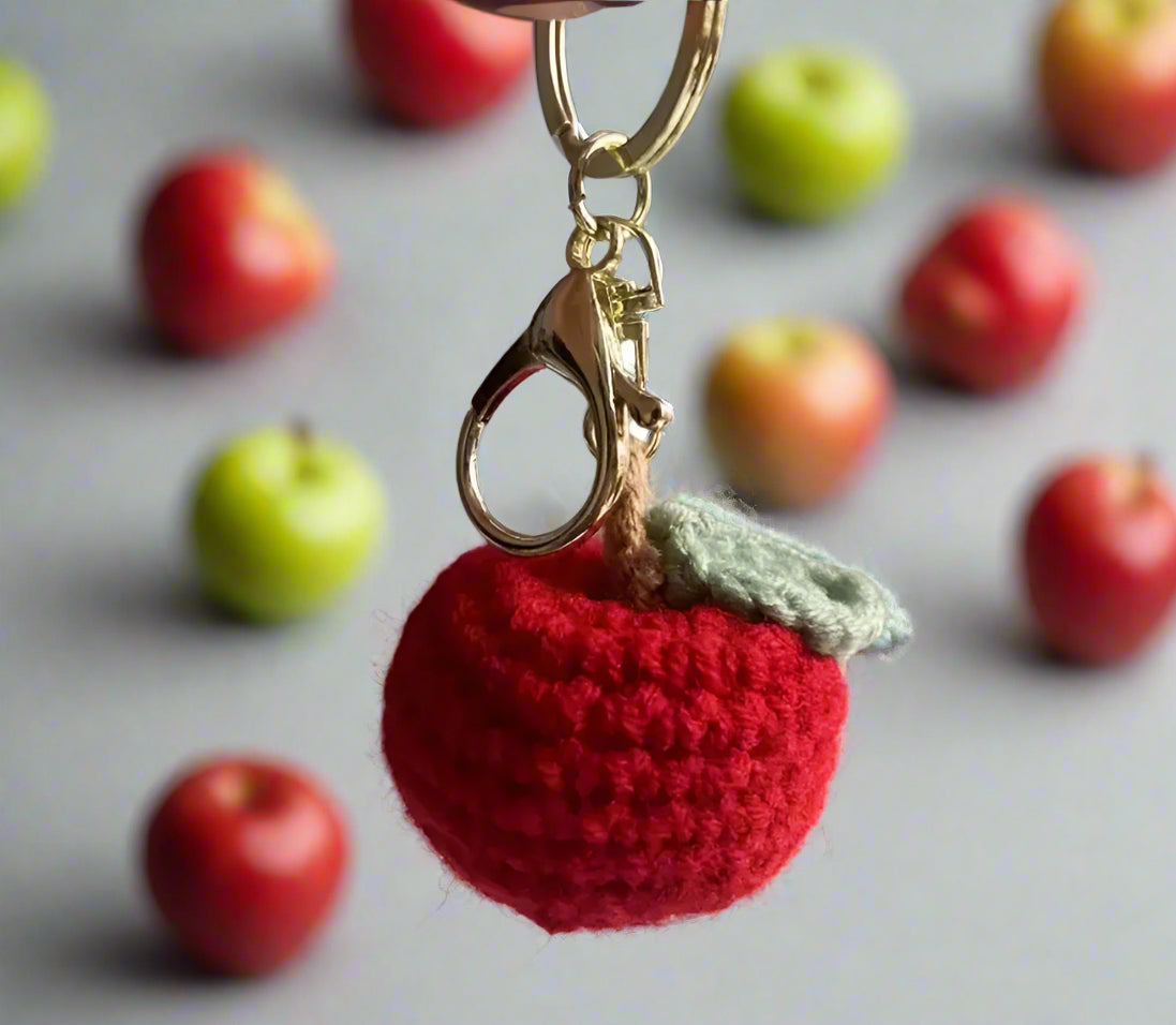 knitted apple on gold keyring
