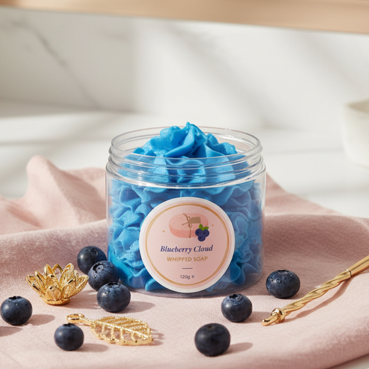 Blueberry Cloud Whipped Soap lifestyle shot with blueberries and spa elements