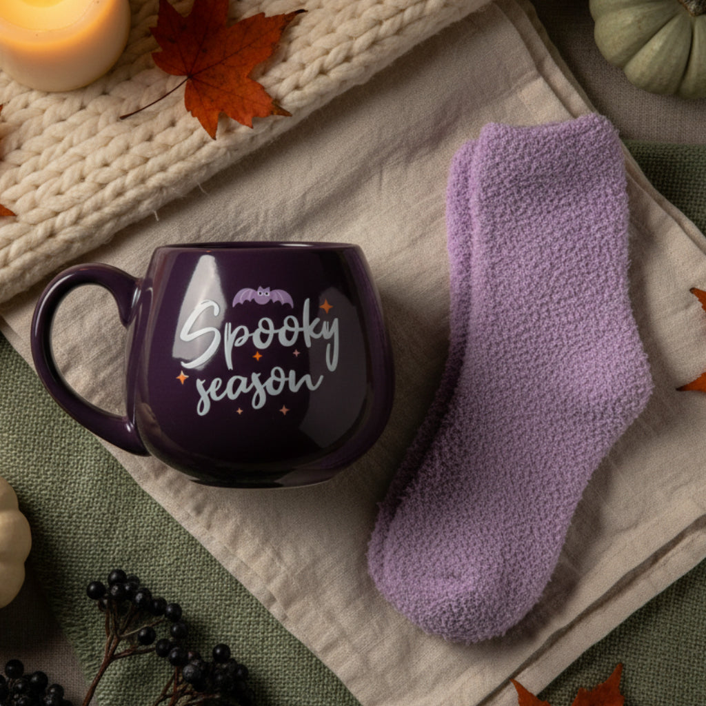 spooky season purple mug and lilac fuzzy socks