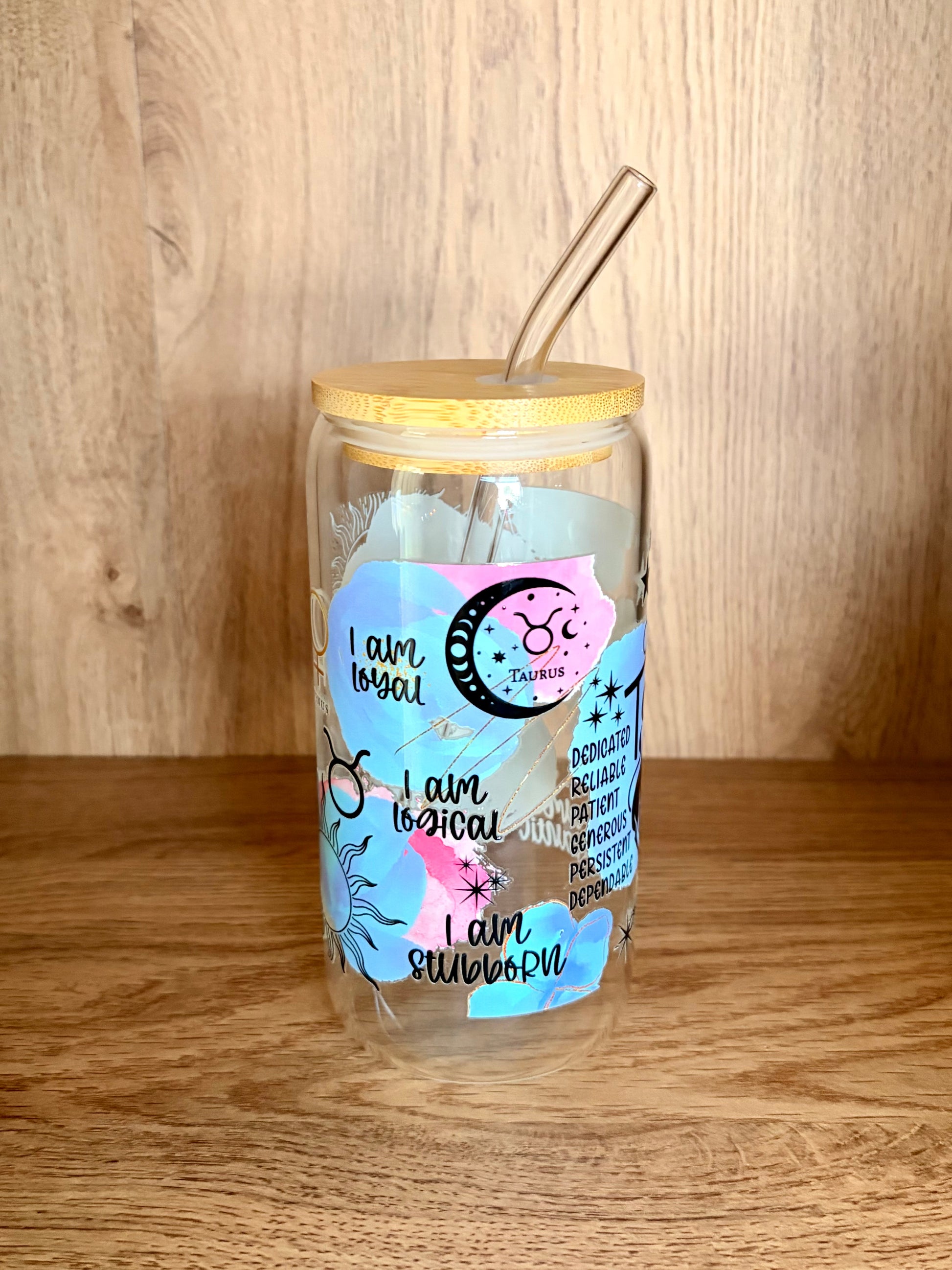 Taurus zodiac glass can showing Taurus script lettering with bull illustration and I am sensual, I am romantic affirmations