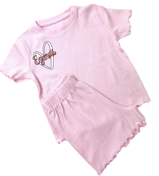 Pink ribbed t-shirt and shorts with hear design and custom name