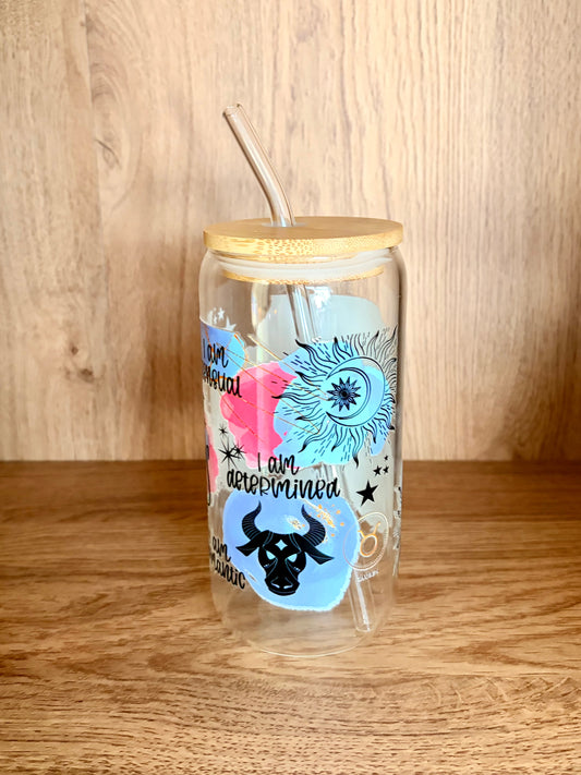 Taurus zodiac glass can showing I am determined affirmation with bull motif and sun and moon illustration