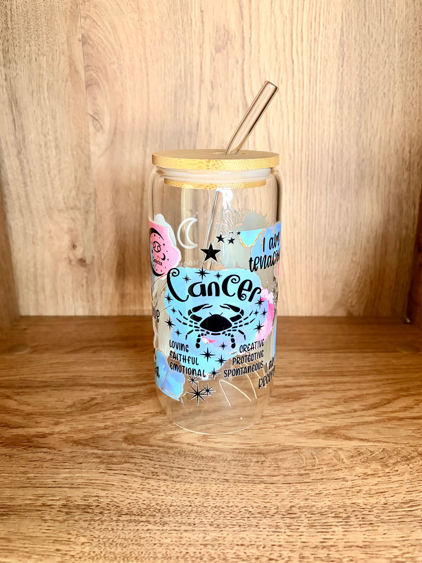 Cancer zodiac glass can showing Cancer script lettering with crab illustration and traits: loving, faithful, emotional, creative, protective, spontaneous