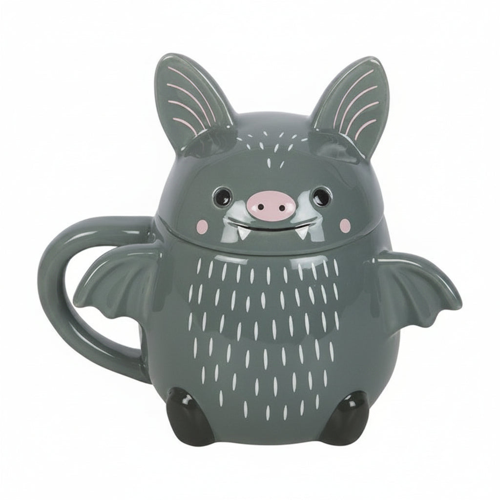 Gray bat-shaped mug with a pink nose on a white background