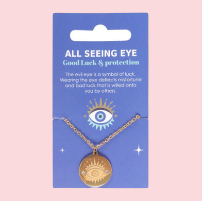close-up of gold necklace with eye of province