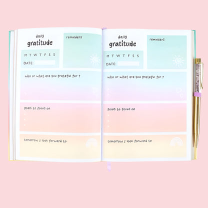 flay lay of open journal visual of pages
