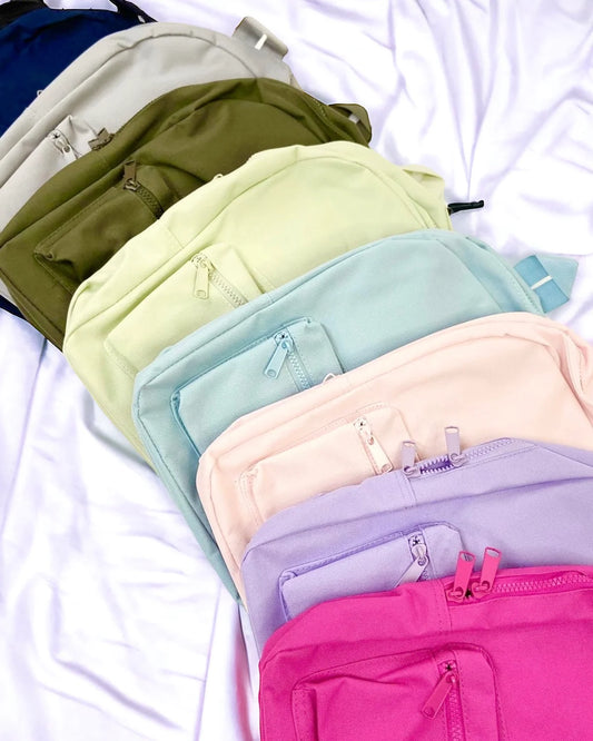10 colour options for personalised kids backpack - including Light blue, navy, white, black, light pink, lavender, pistachio, olive and natural