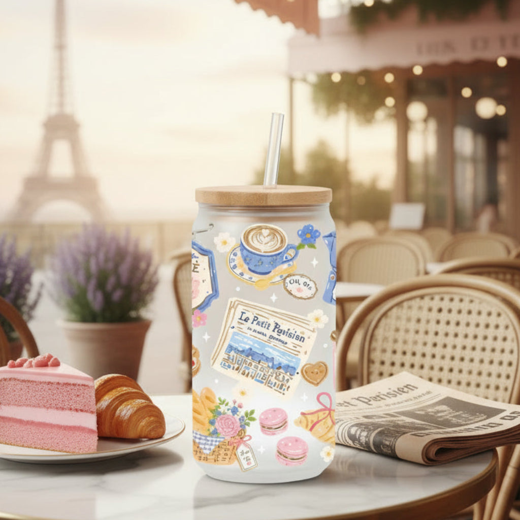 glass with illustrations of coffee and tea-themed graphics on a cafe style background