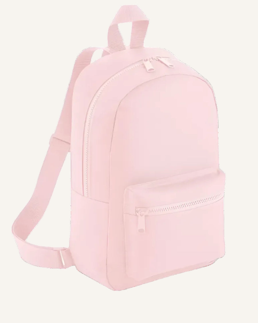 Pink backpack on a ivory background