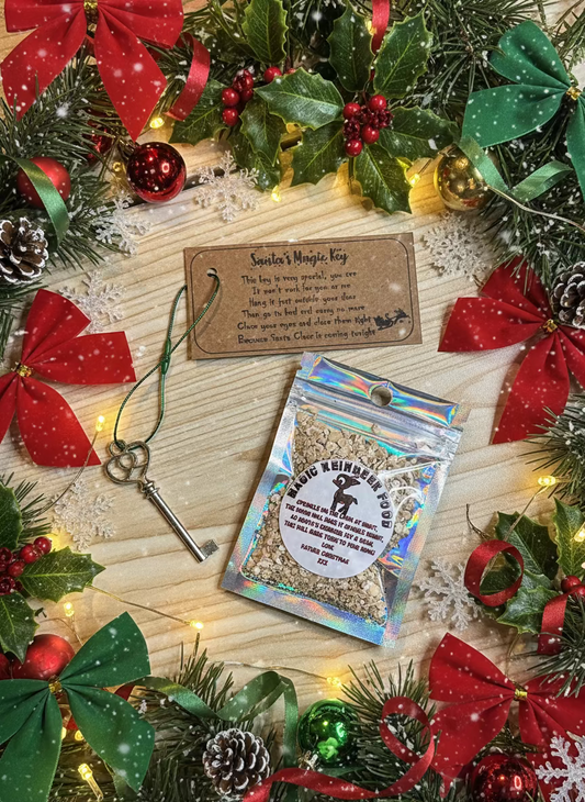 Keychain, bag of reindeer food, and tag on a wooden surface