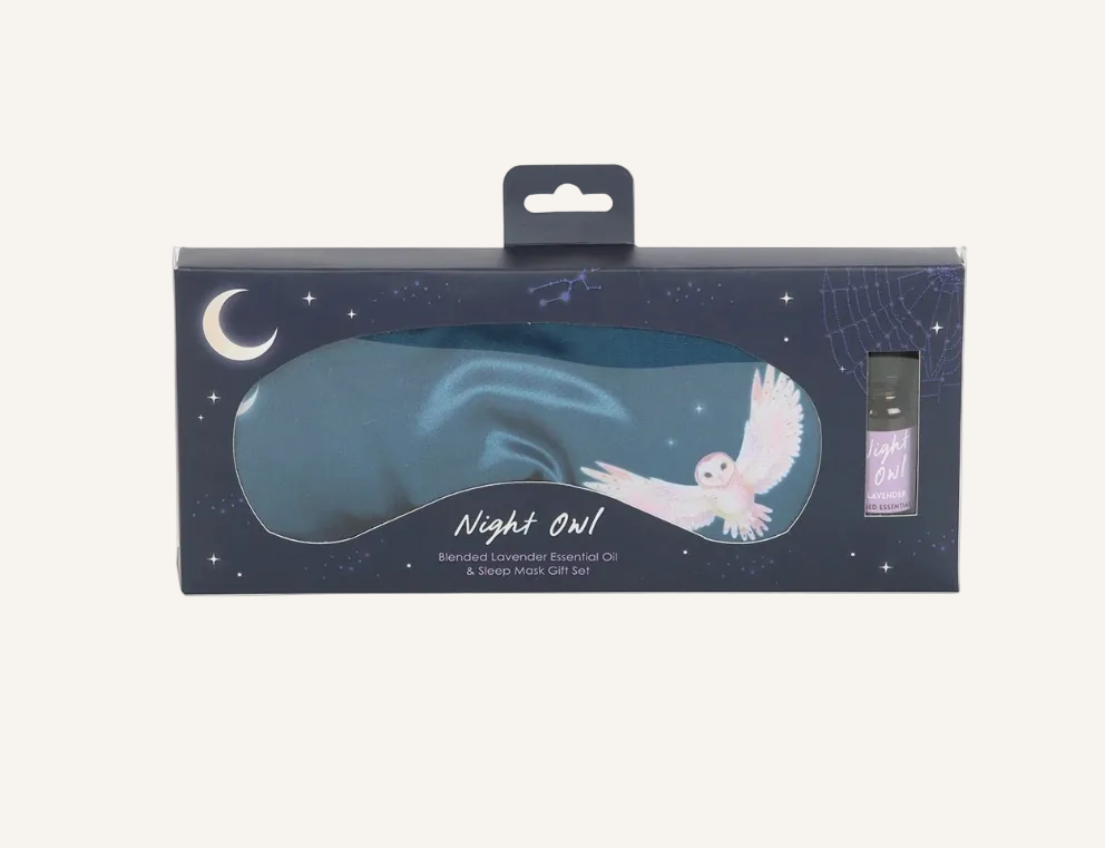 Night Owl scented sleep set in its retail packaging, featuring a dark blue sleep mask with an owl graphic and a small lavender bottle.