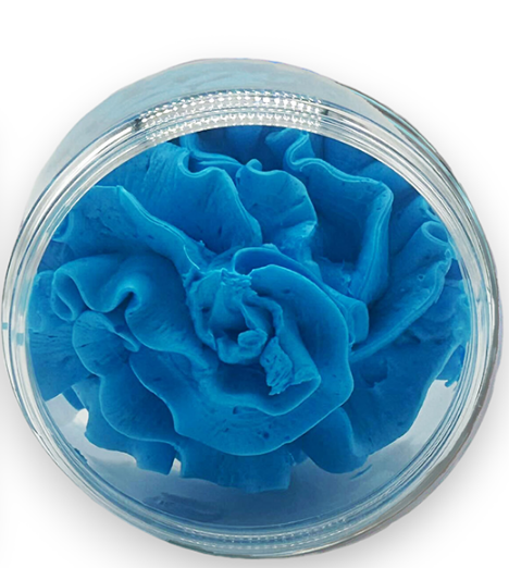 Blueberry cloud whipped soap in a clear jar on a white background