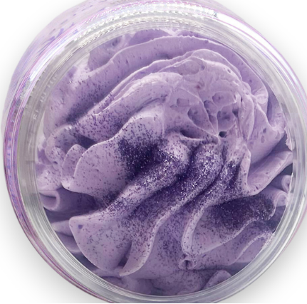 Jar of Sweet Plum & Vanilla whipped soap with a lid removed on a white background