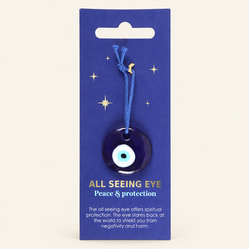 All Seeing Eye charm on a warm ivory background