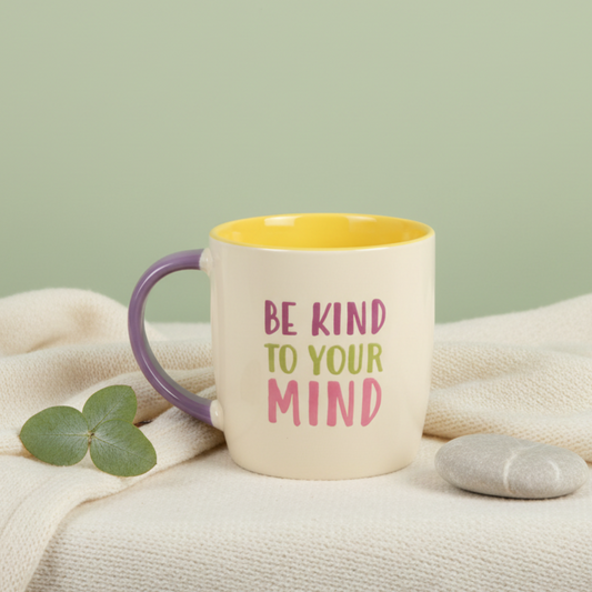 be kind to your mind mug on a ivory blanket and sage green background