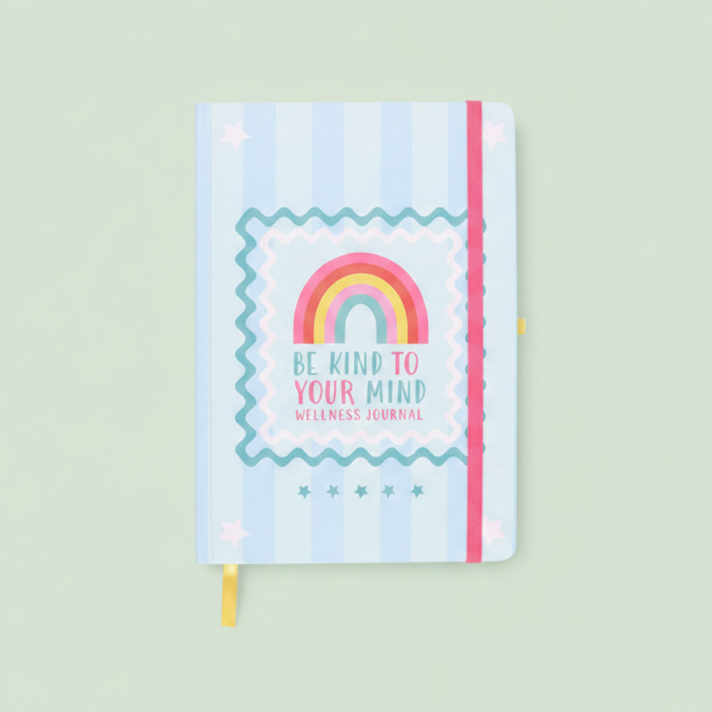 A light blue and white striped journal  with a pink elastic closure band, featuring a colorful rainbow graphic and the text 'BE KIND TO YOUR MIND' on the front cover.