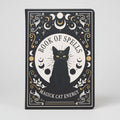 notebook with 'book of spells' and black cat design on a grey background