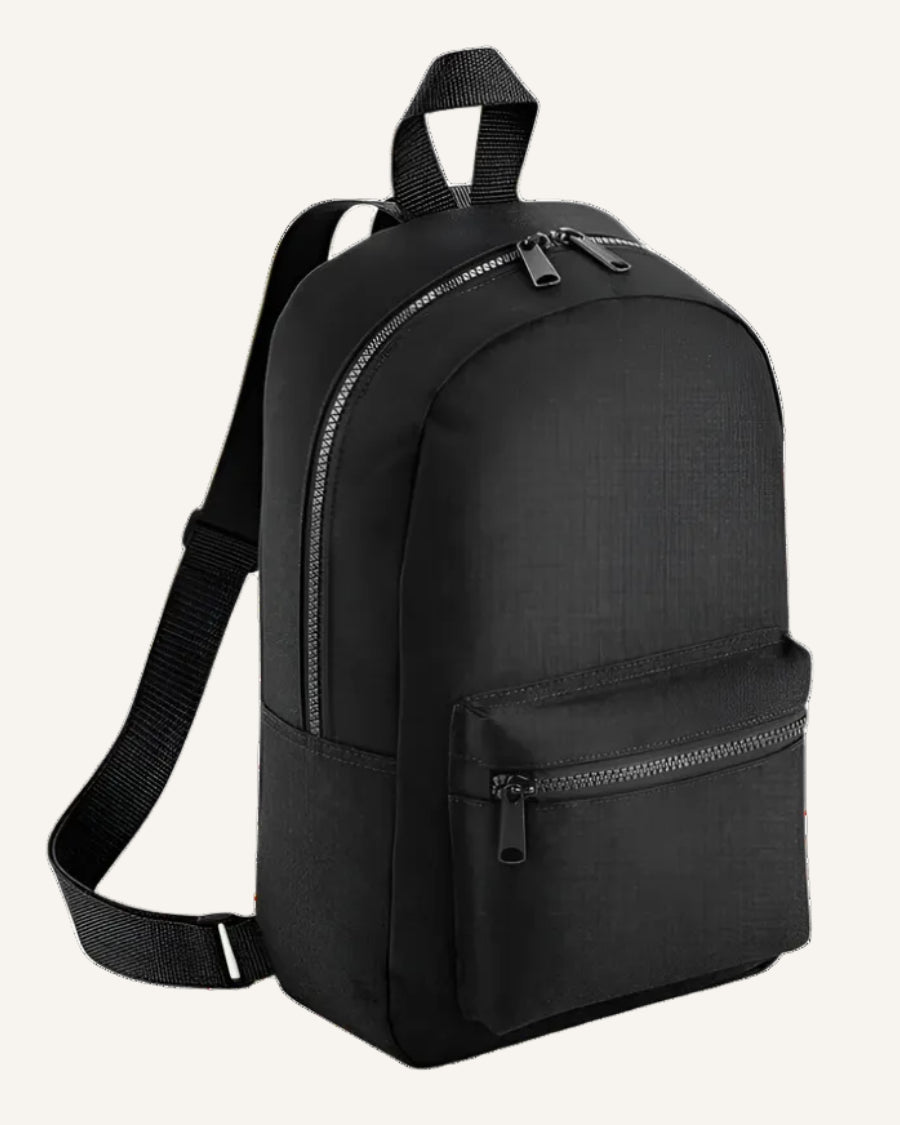 Black backpack on a ivory background