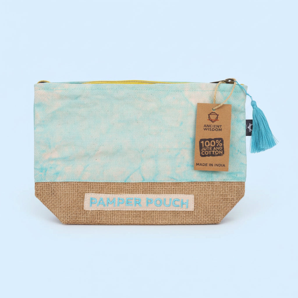 Pamper pouch with blue floral pattern and brown base, featuring a tag and tassel on a light blue background.