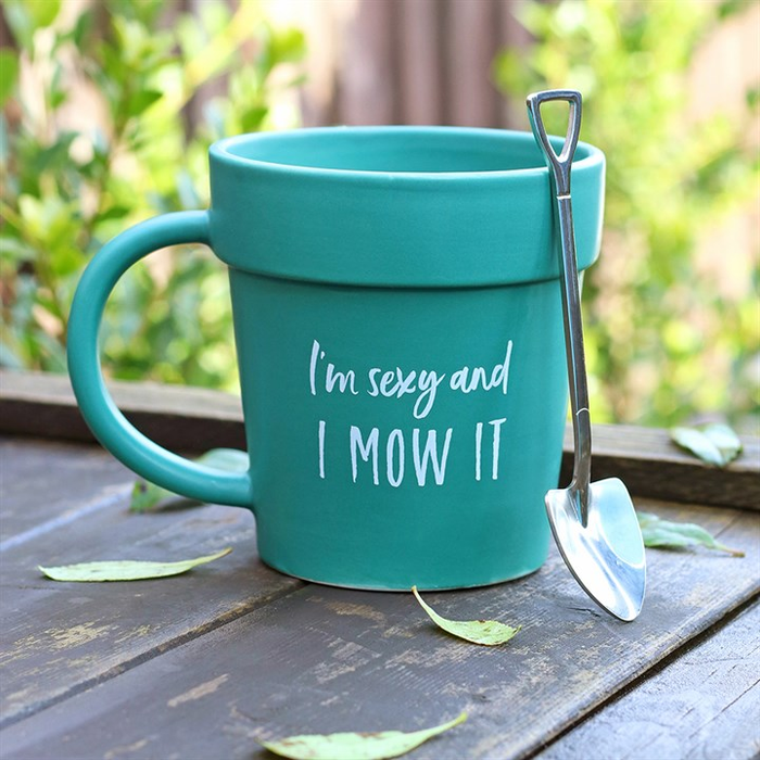 blue plant pot style mug and spade shaped spoon with text 'im sexy and i mow it'