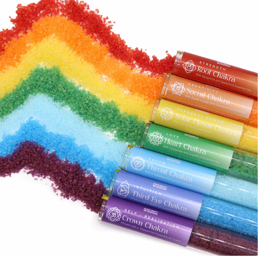 Set of colorful chakra bath salts in tubes