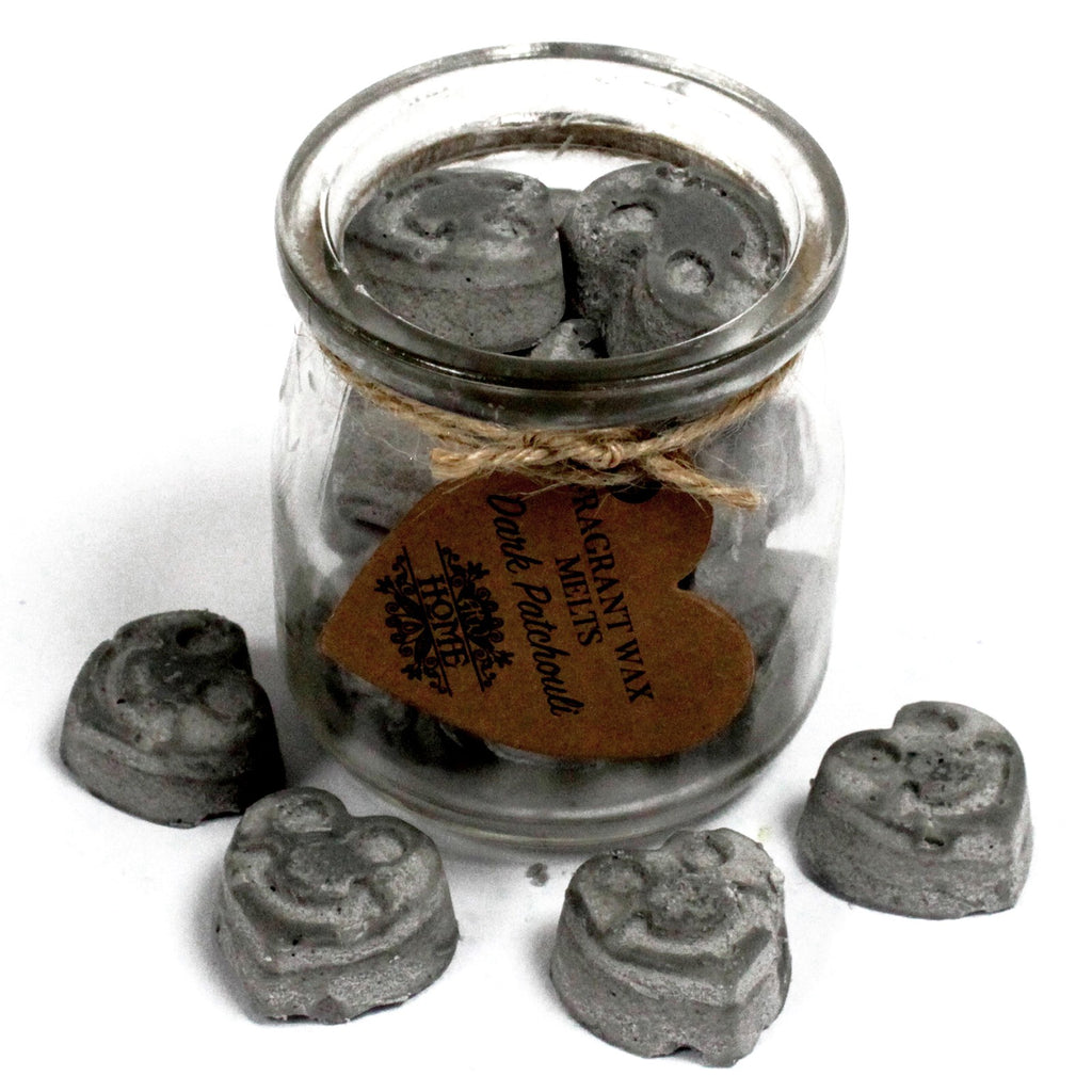 Jar of heart-shaped wax melts with a label on a white background