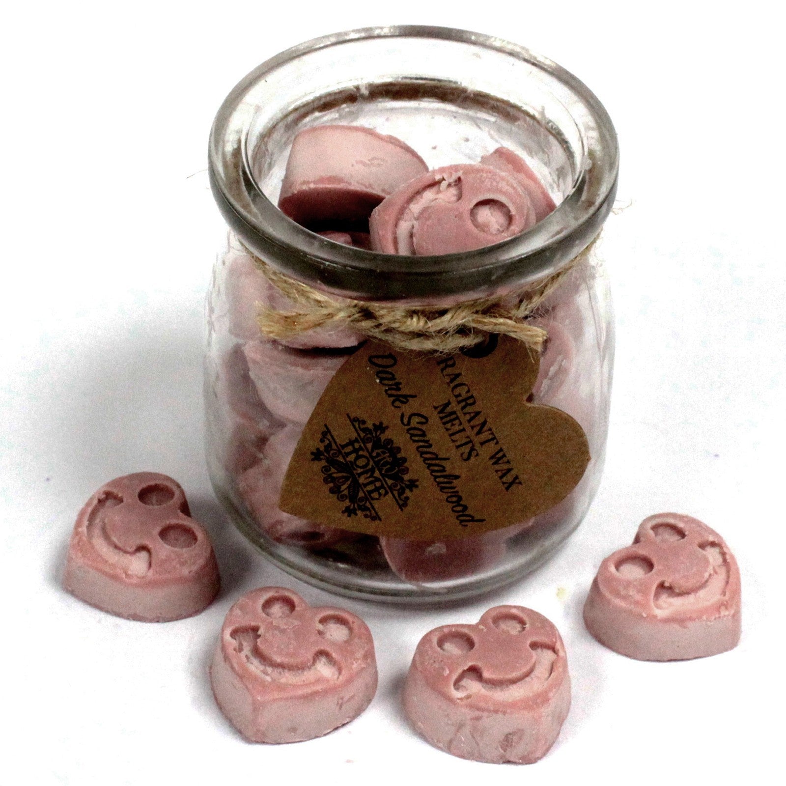 jar of brown heart-shaped wax melts in glass jar on white background