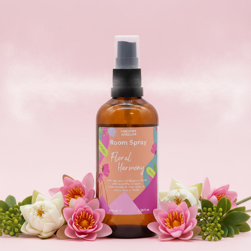 Room spray bottle labeled 'Floral Harmony' on a pink background