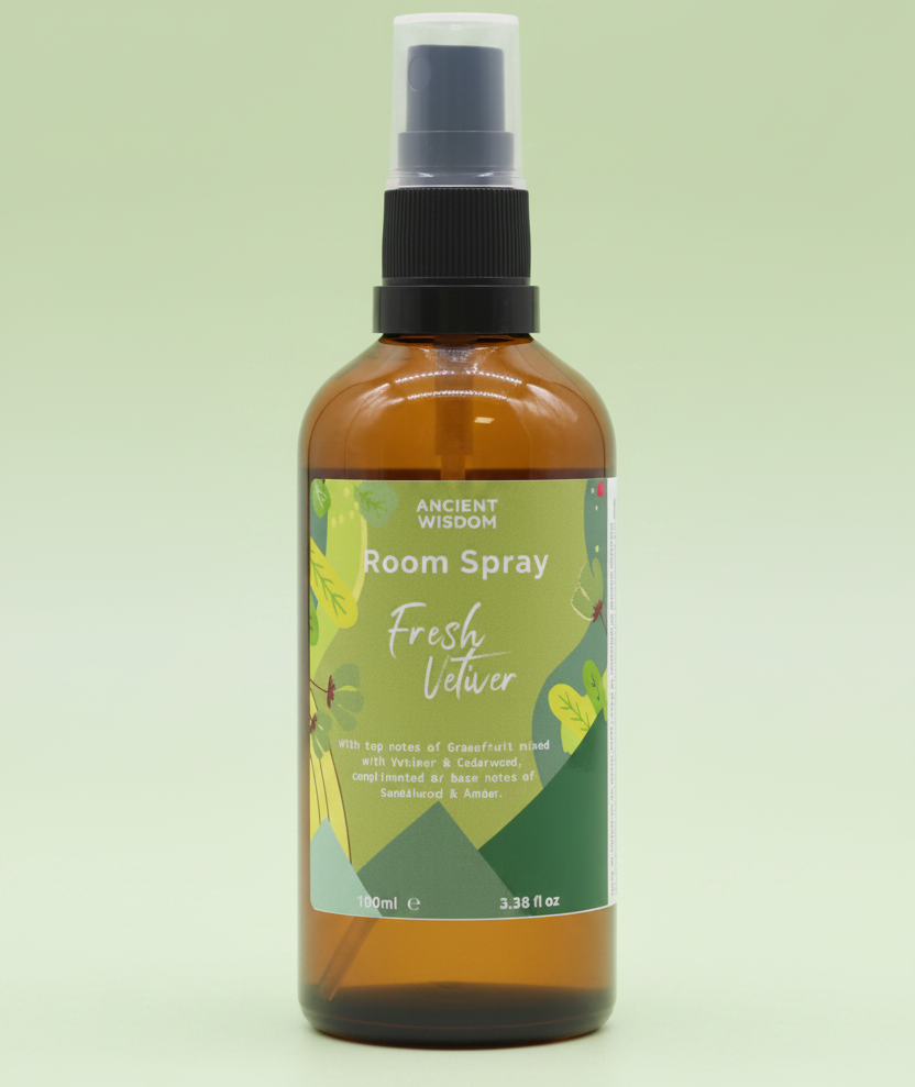 fresh vetiver room spray bottle on a green background