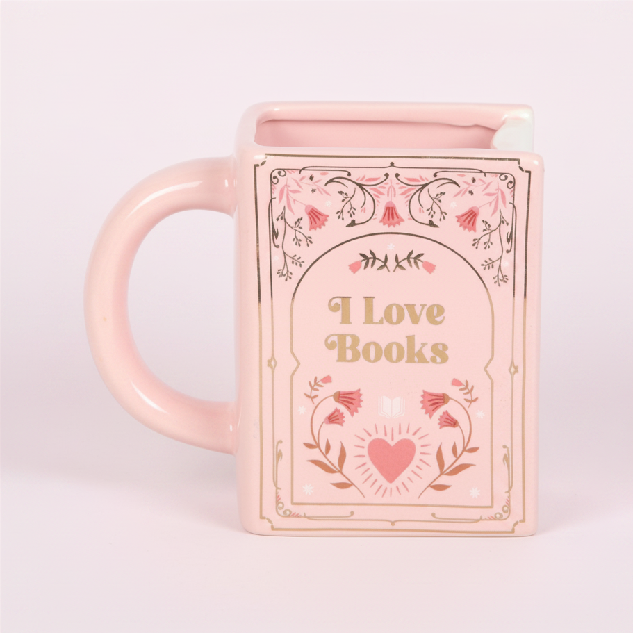 Pink mug with 'I Love Books' design on a white background