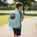 Personalised Football Light Blue Backpack with Noah in gold cursive script