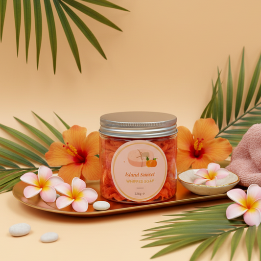 Island Sunset Whipped Soap lifestyle shot with tropical decor and gold accents