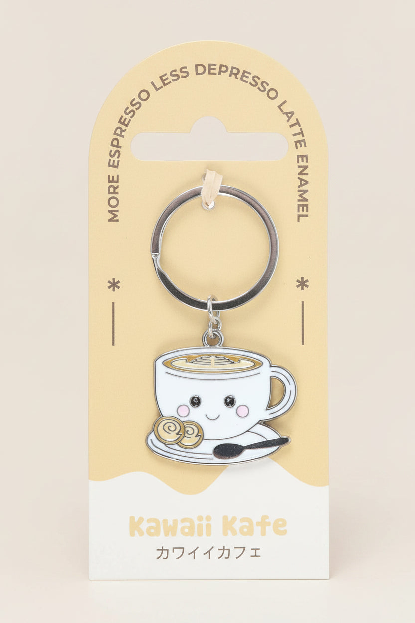 Keychain shaped like a coffee cup with a smiley face on a Kawaii Kafe branded card.