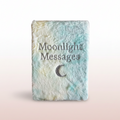 Textured notebook with 'Moonlight Messages' and a moon symbol on a pastel background