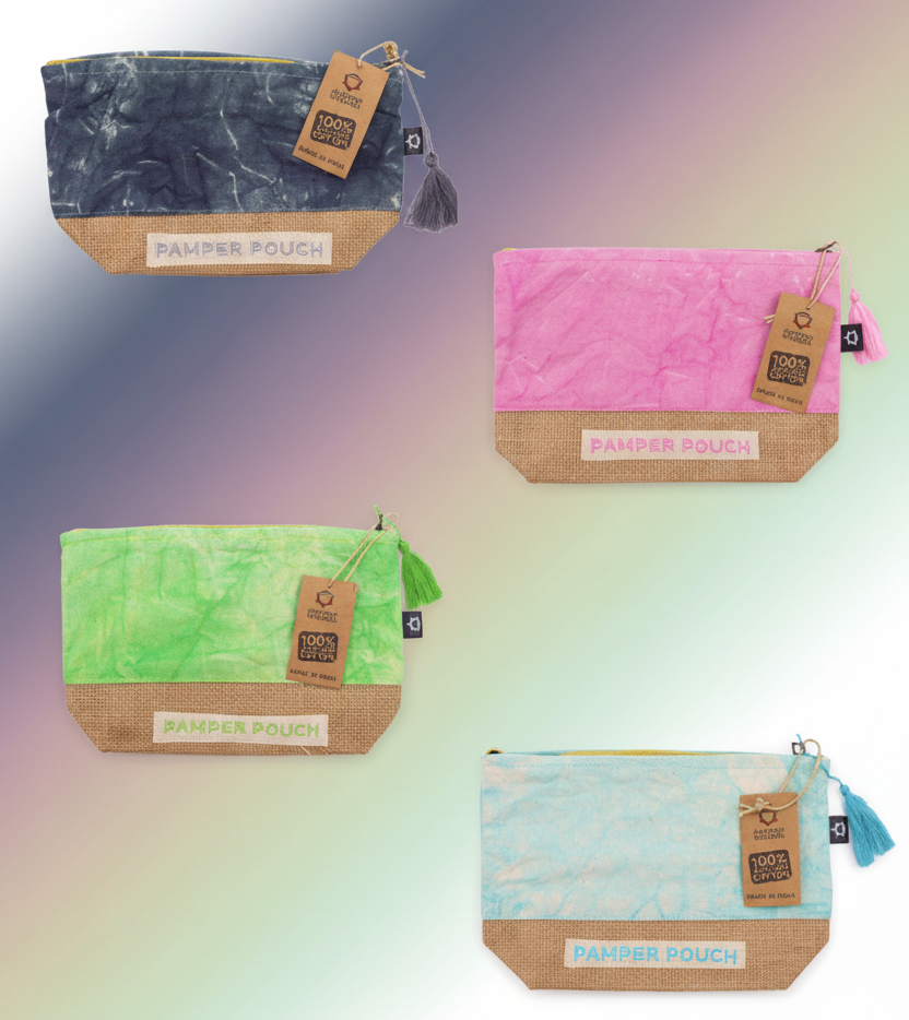 Four reusable bags in different colors with visible branding on a pastel background