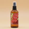 Room spray bottle labeled 'Patchouli Forest' on a orange background