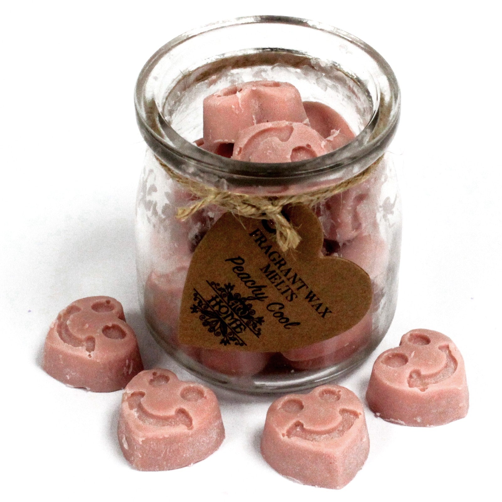 Jar of pink wax melts with a heart-shaped tag on a white background